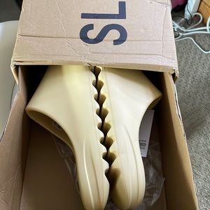 Brand new Yeezy slides, never worn just got the wrong size so am now selling .